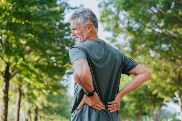 Senior men with back pain